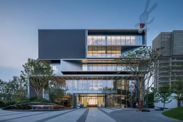Foshan City Showroom completed ground-level elevation at dusk