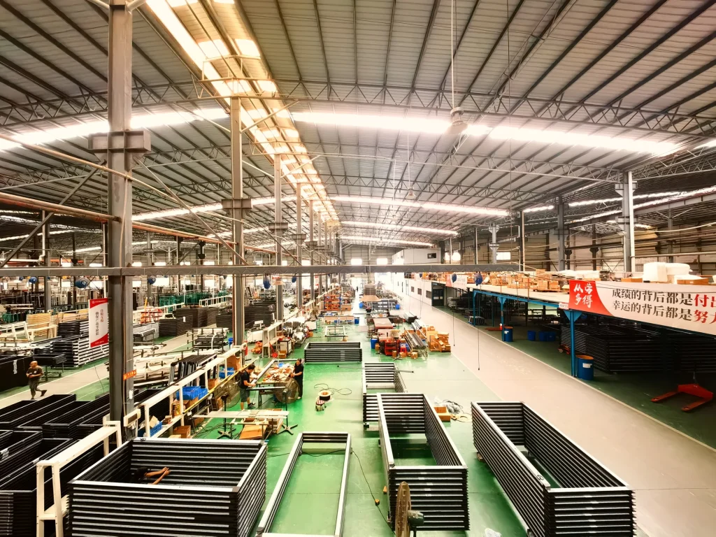 Starveil curtain wall manufacturing floor in Foshan with aluminium fabrication equipment and organised work zones
